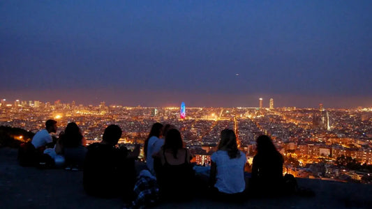 Erasmus Barcelona. Mobility students having a good time and hanging out in Bunkers del Carmen at sunset.